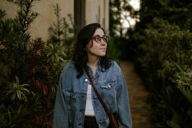 woman-in-denim-jacket-in-garden