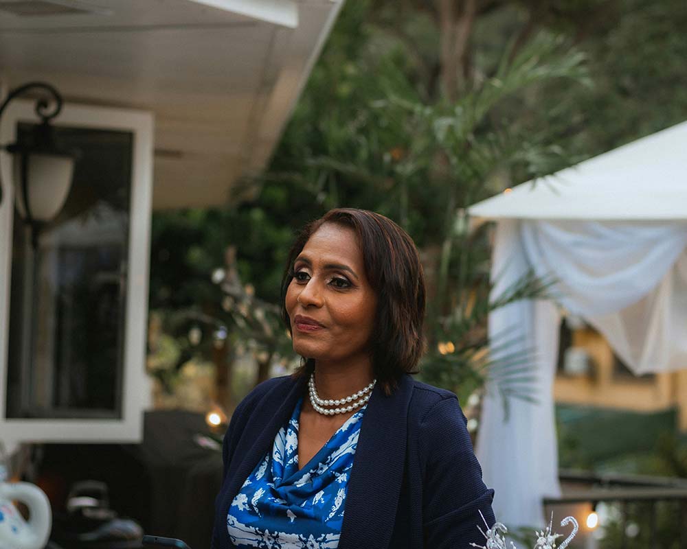 A person wearing a blue dress.